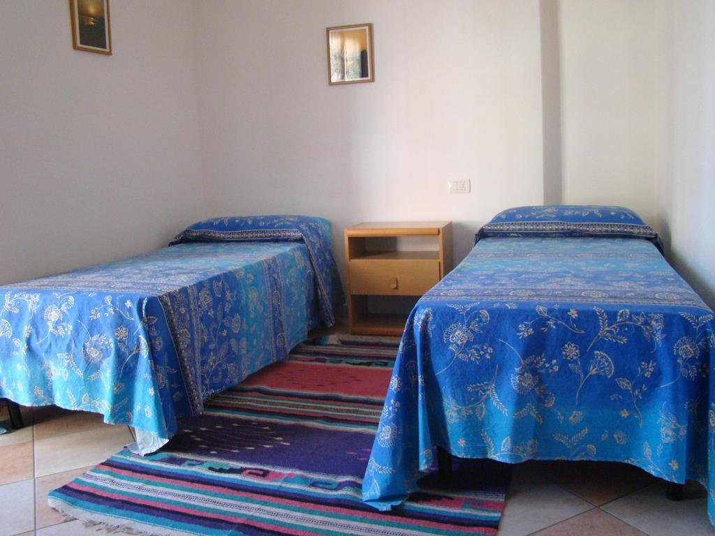 Appartamento Deledda Муравьера Номер фото